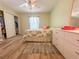 Bright bedroom with a double bed, large closet, and tile floors at 13468 Romford Ave, Port Charlotte, FL 33981