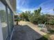 Spacious backyard with patio and lush landscaping at 13468 Romford Ave, Port Charlotte, FL 33981