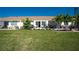 Large grassy backyard, perfect for outdoor recreation at 6796 Gasparilla Pines Blvd # 95, Englewood, FL 34224