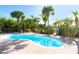 Inviting kidney-shaped pool with surrounding patio at 431 Kettle Harbor Dr, Placida, FL 33946
