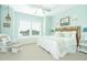 Spacious main bedroom with a king-size bed and water views at 431 Kettle Harbor Dr, Placida, FL 33946
