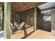 Covered patio area with seating for outdoor dining at 431 Kettle Harbor Dr, Placida, FL 33946