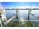 Private boat lift with dual lifts for convenient water access at 431 Kettle Harbor Dr, Placida, FL 33946