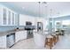 Open concept kitchen with island seating and stainless steel appliances at 431 Kettle Harbor Dr, Placida, FL 33946