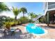 Enjoy this kidney shaped pool with lounge chairs at 431 Kettle Harbor Dr, Placida, FL 33946