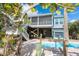 Two-story home with a pool and fenced backyard at 431 Kettle Harbor Dr, Placida, FL 33946