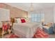 Main bedroom with a king bed and tropical-themed decor at 5700 Gulf Shores Dr # B134, Boca Grande, FL 33921