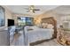 Spacious bedroom with ocean view and ensuite bathroom at 5700 Gulf Shores Dr # B134, Boca Grande, FL 33921