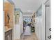 Bright and airy entryway with ocean view, beachy decor, and hardwood floors at 5700 Gulf Shores Dr # B134, Boca Grande, FL 33921