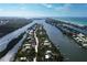 Aerial view of waterfront community with homes and canals at 201 Kettle Harbor Dr, Placida, FL 33946