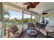 Enjoy water views from this screened porch with comfortable seating at 201 Kettle Harbor Dr, Placida, FL 33946