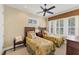 Guest bedroom with twin beds and plantation shutters at 201 Kettle Harbor Dr, Placida, FL 33946