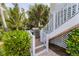 Outdoor kitchen area with built-in grill and patio seating at 201 Kettle Harbor Dr, Placida, FL 33946
