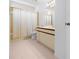 Bathroom featuring a shower with glass doors, a toilet, and a vanity at 104 Park Forest Blvd, Englewood, FL 34223