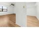 Bedroom showcasing hardwood floors and a closet for storage at 104 Park Forest Blvd, Englewood, FL 34223