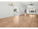 Bright living room with modern lighting, sleek floors and open layout at 104 Park Forest Blvd, Englewood, FL 34223
