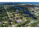 Aerial view showing home, lot, and surrounding area at 110 S Oxford Dr, Englewood, FL 34223