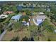 Aerial view showing home's location in a quiet residential area at 110 S Oxford Dr, Englewood, FL 34223