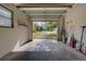 Attached garage with automatic door opener, offering ample storage space at 110 S Oxford Dr, Englewood, FL 34223