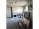 Garage with washer, sink, and building materials at 110 S Oxford Dr, Englewood, FL 34223