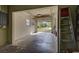 One-car garage with extra storage space and access to backyard at 110 S Oxford Dr, Englewood, FL 34223