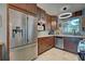 Modern kitchen with stainless steel appliances and ample cabinetry at 110 S Oxford Dr, Englewood, FL 34223