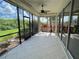 Relaxing screened patio with tiled flooring, offering a peaceful outdoor space at 4691 Club Dr # 102, Port Charlotte, FL 33953