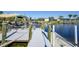 Private dock with multiple boat slips and room for entertaining at 9194 Impala Cir, Port Charlotte, FL 33981