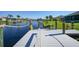 Private dock with water access, perfect for enjoying Florida's waterways at 9194 Impala Cir, Port Charlotte, FL 33981
