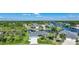 Aerial view of waterfront community with houses and canals at 9194 Impala Cir, Port Charlotte, FL 33981