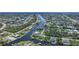 Wide aerial view of waterfront homes and community at 9194 Impala Cir, Port Charlotte, FL 33981