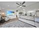 Open living space with sectional sofa and views into kitchen and backyard at 9194 Impala Cir, Port Charlotte, FL 33981