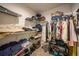 Walk-in closet with wire shelving and hanging rods at 9194 Impala Cir, Port Charlotte, FL 33981