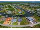 Waterfront property, showcasing home and surroundings at 8250 Arlewood Cir, Port Charlotte, FL 33981