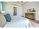 Bedroom with king bed, dresser, and access to bathroom at 8250 Arlewood Cir, Port Charlotte, FL 33981
