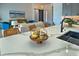 Kitchen island with quartz countertop and seating area at 8250 Arlewood Cir, Port Charlotte, FL 33981