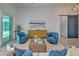Relaxing living room with comfy seating and sliding glass doors at 8250 Arlewood Cir, Port Charlotte, FL 33981