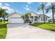 Single-Gathering home with two-car garage and landscaping at 26021 Templar Ln, Punta Gorda, FL 33983