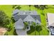 An aerial view showcasing a single-Gathering home with pool and attached garage at 26021 Templar Ln, Punta Gorda, FL 33983