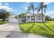 Single-Gathering home with two-car garage and landscaping at 26021 Templar Ln, Punta Gorda, FL 33983