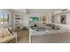 Comfortable living room with wicker furniture and coastal decor at 5850 Gasparilla Rd # M1&3, Boca Grande, FL 33921