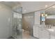 Modern bathroom with glass shower and white vanity at 5850 Gasparilla Rd # M1&3, Boca Grande, FL 33921