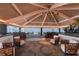 Open and airy dining area with stunning ocean views at 5850 Gasparilla Rd # M1&3, Boca Grande, FL 33921