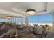 Oceanfront dining area with large windows and beach views at 5850 Gasparilla Rd # M1&3, Boca Grande, FL 33921