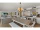 Open living and dining area with coastal decor at 5850 Gasparilla Rd # M1&3, Boca Grande, FL 33921