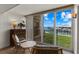 Relaxing sitting area with water views and wicker furniture at 5850 Gasparilla Rd # M1&3, Boca Grande, FL 33921