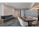 Modern dining room with a fireplace and tables at 5850 Gasparilla Rd # M1&3, Boca Grande, FL 33921