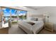 Spacious main bedroom with water views and modern decor at 5850 Gasparilla Rd # M1&3, Boca Grande, FL 33921