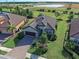 Single-Gathering home with landscaped yard and driveway at 26724 Weiskopf Dr, Englewood, FL 34223