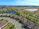 Aerial view of a house in a residential community at 26724 Weiskopf Dr, Englewood, FL 34223